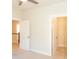 Comfortable bedroom featuring neutral carpet and access to both a closet and staircase at 464 Eager Ct, Marietta, GA 30064