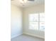 Bright bedroom with natural light, ceiling fan, and neutral carpet at 464 Eager Ct, Marietta, GA 30064