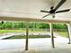 Covered patio overlooking inground pool and landscaped yard at 464 Eager Ct, Marietta, GA 30064