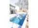 An inviting in-ground pool with crystal-clear water offers a refreshing escape on warm days at 464 Eager Ct, Marietta, GA 30064