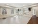 Finished basement featuring mirrored wall, dark hardwood floors, and space for a personal gym at 4520 Valence Dr, Cumming, GA 30040
