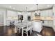Kitchen featuring granite countertops, stainless steel appliances, and ample cabinet space at 4520 Valence Dr, Cumming, GA 30040