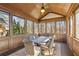 Screened-in patio with views of surrounding trees at 4520 Valence Dr, Cumming, GA 30040