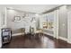 Bright sitting area with hardwood floors, white trim, and a window providing ample natural light at 4520 Valence Dr, Cumming, GA 30040