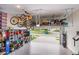 View of garage featuring a ceiling mounted storage system and epoxy flooring at 1497 English Nw St, Atlanta, GA 30318