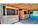 View of multiple barn stalls, showing wooden construction and mesh wire at 3889 Pineybrook Dr, Loganville, GA 30052