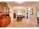 Elegant dining room with chandelier and large windows at 3889 Pineybrook Dr, Loganville, GA 30052