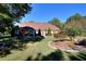Ranch style home with mature landscaping and expansive lawn at 3889 Pineybrook Dr, Loganville, GA 30052