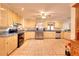 Spacious kitchen featuring stainless steel appliances, stone countertops, and ample cabinet space at 3889 Pineybrook Dr, Loganville, GA 30052