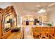 Bright eat-in kitchen area with tan cabinetry, stainless steel appliances, and stone countertops at 3889 Pineybrook Dr, Loganville, GA 30052