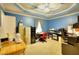 Bright office space featuring blue walls, carpeted floors, and modern ceiling fan at 3889 Pineybrook Dr, Loganville, GA 30052