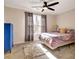 Bedroom featuring a window, a blue dresser, carpet flooring, and neutral walls at 551 Lees Mill Rd, Fayetteville, GA 30214