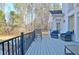 Outdoor deck with comfortable seating, ideal for enjoying the serene views and outdoor living at 551 Lees Mill Rd, Fayetteville, GA 30214