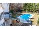 Relax and unwind in this beautiful outdoor area featuring a spacious deck and private in-ground pool at 551 Lees Mill Rd, Fayetteville, GA 30214