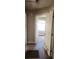 Hallway featuring natural light, hardwood floors, and doorway at 1497 Clermont Ct, Atlanta, GA 30344
