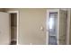 Hallway and closet space showcase an open door frame and neutral-toned walls at 1497 Clermont Ct, Atlanta, GA 30344