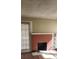 Interior view of the living room featuring a brick fireplace with built-in shelves on either side at 1497 Clermont Ct, Atlanta, GA 30344