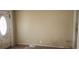 Bright living room featuring an inviting front door with neutral-toned walls at 1497 Clermont Ct, Atlanta, GA 30344