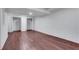 Spacious basement with wood-look flooring and white walls and two closet areas at 2250 Deer Oaks Trl, Lawrenceville, GA 30044
