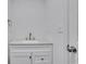 Bathroom featuring a vanity with a modern sink and white cabinets at 2250 Deer Oaks Trl, Lawrenceville, GA 30044