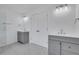 Neutral toned bathroom with double sinks and tile flooring at 2250 Deer Oaks Trl, Lawrenceville, GA 30044