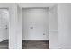 Spacious closet area with bi-fold doors, modern lighting, and plenty of storage space at 2250 Deer Oaks Trl, Lawrenceville, GA 30044