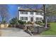 Charming two-story home with a manicured front yard and a welcoming entrance staircase at 2250 Deer Oaks Trl, Lawrenceville, GA 30044