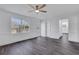Bright living room features modern flooring, a ceiling fan, and natural light at 2250 Deer Oaks Trl, Lawrenceville, GA 30044
