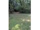 Expansive backyard featuring a shed and lush greenery, providing ample space at 3042 Santa Monica Dr, Decatur, GA 30032