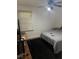 Bedroom setup with a desk, bed, window, and overhead fan at 3042 Santa Monica Dr, Decatur, GA 30032