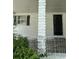 Close-up of the entryway, showcasing a black security door at 3042 Santa Monica Dr, Decatur, GA 30032