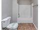 Bathroom with a toilet and tub, perfect for relaxing and unwinding after a long day at 6462 Splitpine Ct, Atlanta, GA 30349