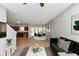 Open-concept living room with modern decor, seamless integration with the kitchen, and elegant furnishings at 6462 Splitpine Ct, Atlanta, GA 30349