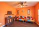 Cozy living room featuring hardwood floors, colorful sofas, and a ceiling fan at 5809 Savannah River, Atlanta, GA 30349