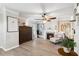 Sophisticated main bedroom with a fireplace, decorative dresser, and contemporary artwork at 149 Manor Lane, Woodstock, GA 30188