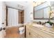 Bathroom featuring granite counters, tile surround and bathtub/shower combination at 3481 Lakeside Ne Dr # 2207, Atlanta, GA 30326