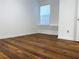 Bedroom featuring laminate flooring, natural light and minimalist decor at 904 Wentworth Ct, Alpharetta, GA 30022