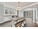 Dining room with hardwood floors and elegant chandelier at 2460 Millwater Crossing Xing, Dacula, GA 30019