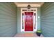 Close up of a front door with sidelights at 2460 Millwater Crossing Xing, Dacula, GA 30019