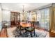 Formal dining room featuring hardwood floors, a chandelier, and classic decor at 3000 Rivermeade Nw Dr, Atlanta, GA 30327