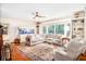 Bright living room with a large bay window, hardwood floors, and comfortable seating at 3000 Rivermeade Nw Dr, Atlanta, GA 30327