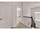 Upstairs hall showing staircase and doorway into the Bedroom at 6441 Se Brookside Blvd, Mableton, GA 30126