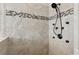 Luxurious shower with upgraded tile accents, a rainfall showerhead and multiple body jets at 102 Glenmill Way, Woodstock, GA 30188