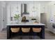 Bright kitchen with an island, pendant lighting, and stainless steel appliances at 158 Palisade Dr, Rydal, GA 30171