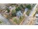 Stunning aerial view of a home with a private pool and detached garage in a lush, tree-lined neighborhood at 350 Lockwood Terrace, Decatur, GA 30030