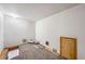 Unfinished basement area with door access and carpeting ready to be customized at 307 Adair St # 7-E, Decatur, GA 30030