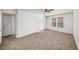 Bedroom featuring carpet, double-hung windows and a closet at 307 Adair St # 7-E, Decatur, GA 30030