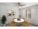 Bright dining room with modern decor, a stylish table set, and a ceiling fan at 307 Adair St # 7-E, Decatur, GA 30030