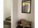 Hallway with stairs, decor and lighting, creating an inviting transition space at 307 Adair St # 7-E, Decatur, GA 30030