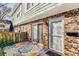 Inviting patio space with colorful outdoor rug and chairs, perfect for relaxing at 307 Adair St # 7-E, Decatur, GA 30030